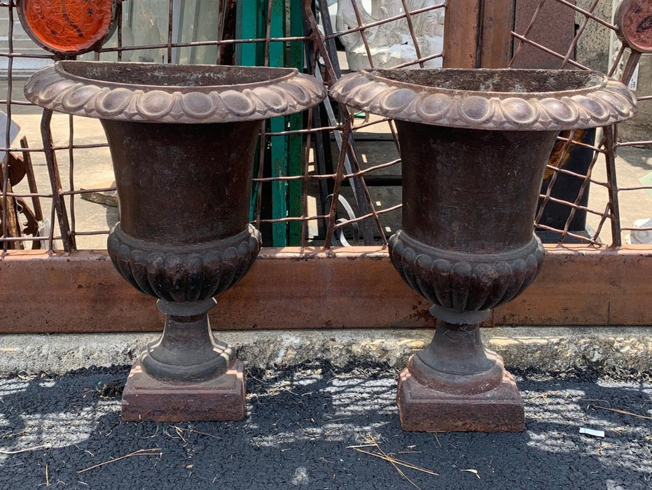 PAIR OF WALL IRON POTS