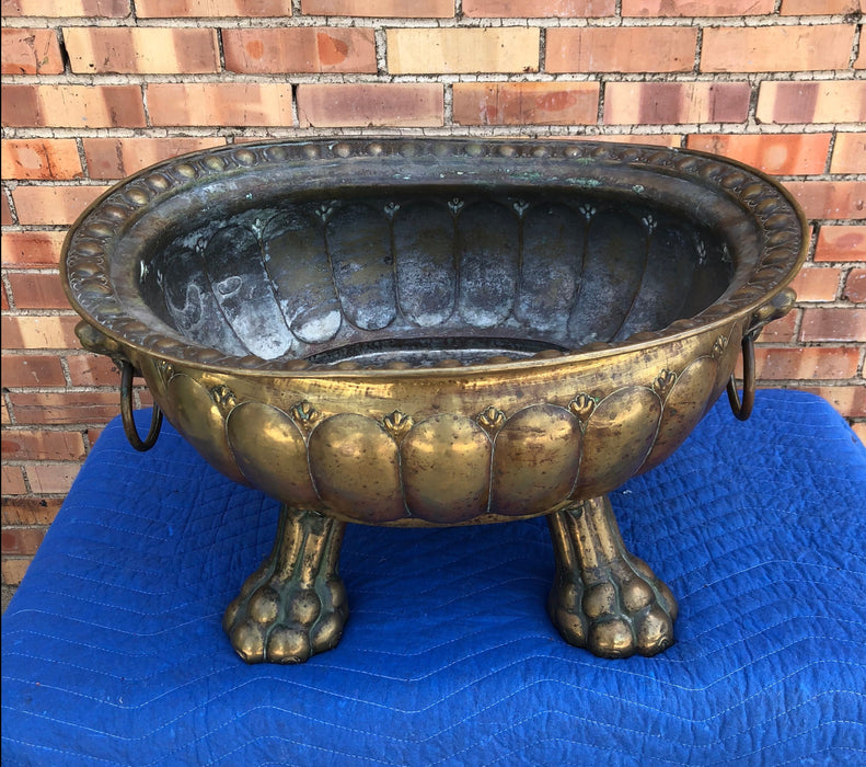 LARGE HANDMADE BRASS PAW-FOOTED OVAL JARDINIERE