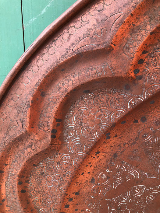 LARGE VINTAGE ETCHED COPPER TRAY ON STAR SHAPED WOODEN COFFEE TABLE BASE