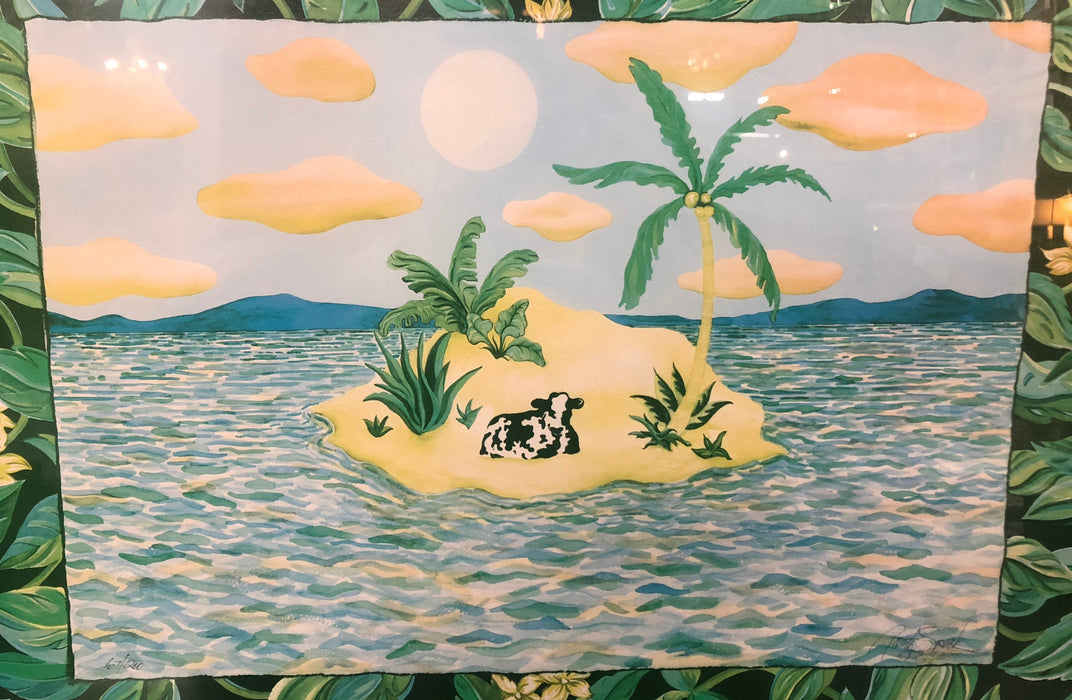 FRAMED PRINT OF A COW ON AN ISLAND
