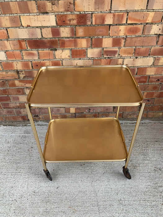 ROSE GOLD METAL ROLLING BAR CART