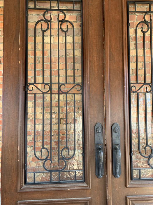 PAIR OF LARGE MAHOGANY DOORS WITH IRON INSERTS