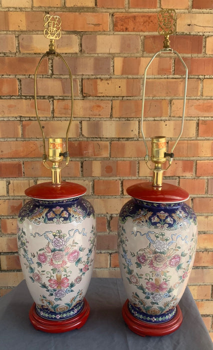 PAIR OF ASIAN POTTERY LAMPS WITH RED BASES