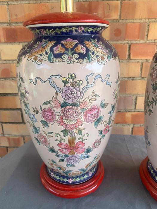 PAIR OF ASIAN POTTERY LAMPS WITH RED BASES