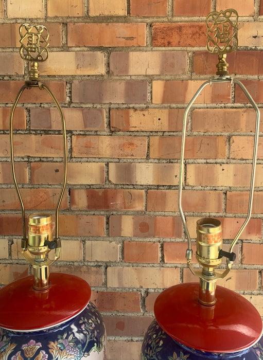 PAIR OF ASIAN POTTERY LAMPS WITH RED BASES