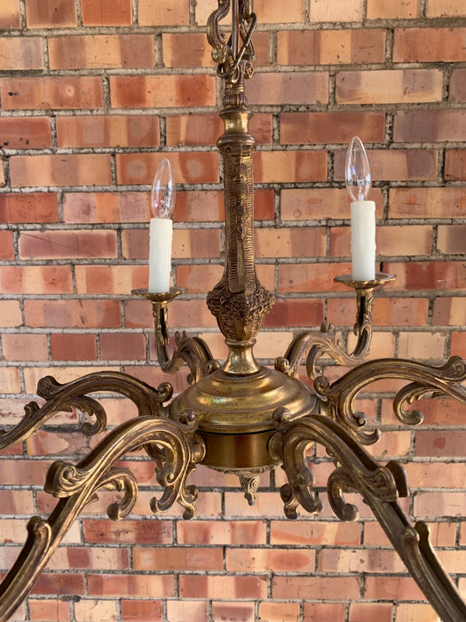 BRASS CHANDELIER WITH WAX COVERS