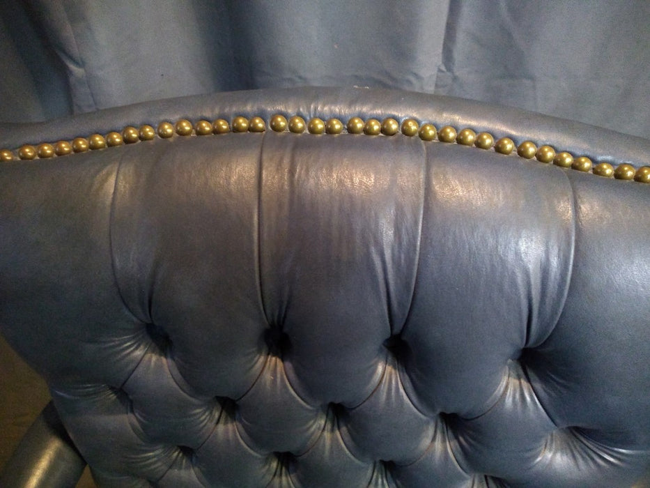 PAIR OF TUFTED BLUE LEATHER ARM CHAIRS