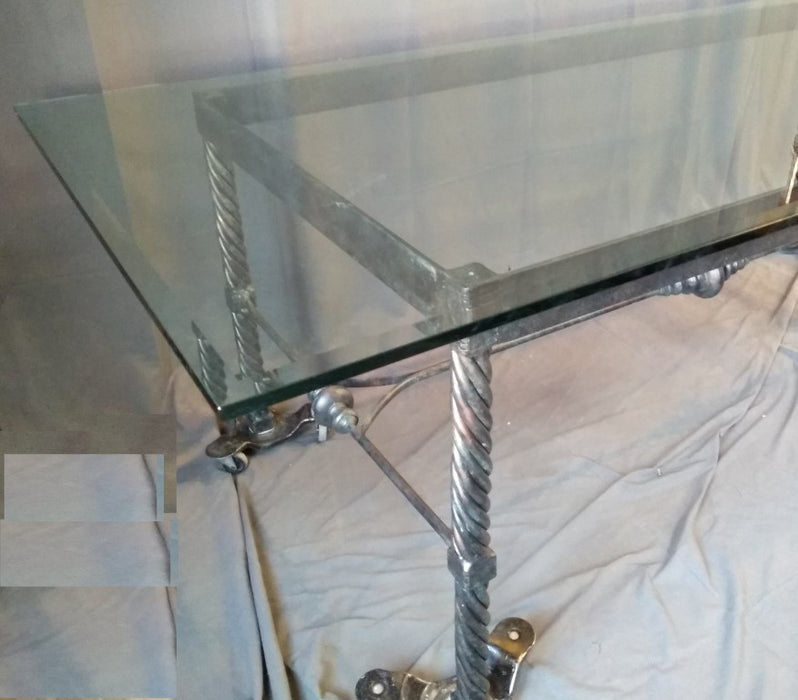 LARGE IRON BASE DINING TABLE WITH THICK GLASS TOP