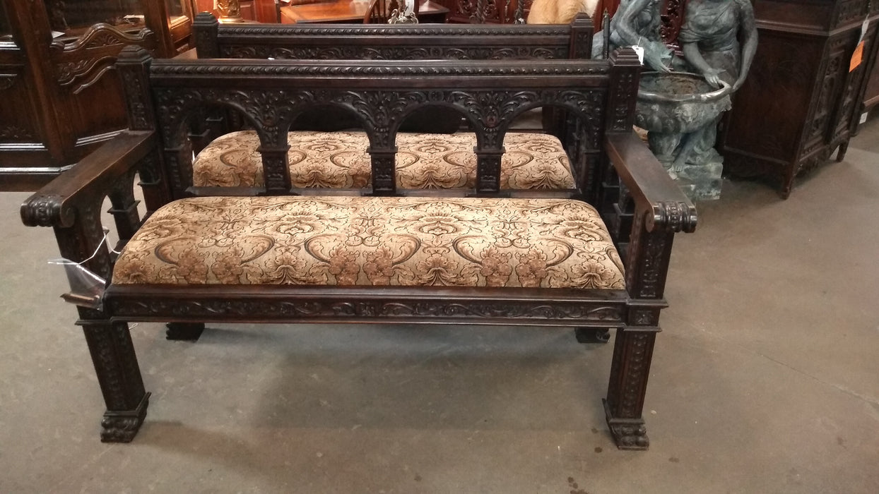 PAIR OF CARVED SPANISH BENCHES WITH CARVED ROMAN ARCHES