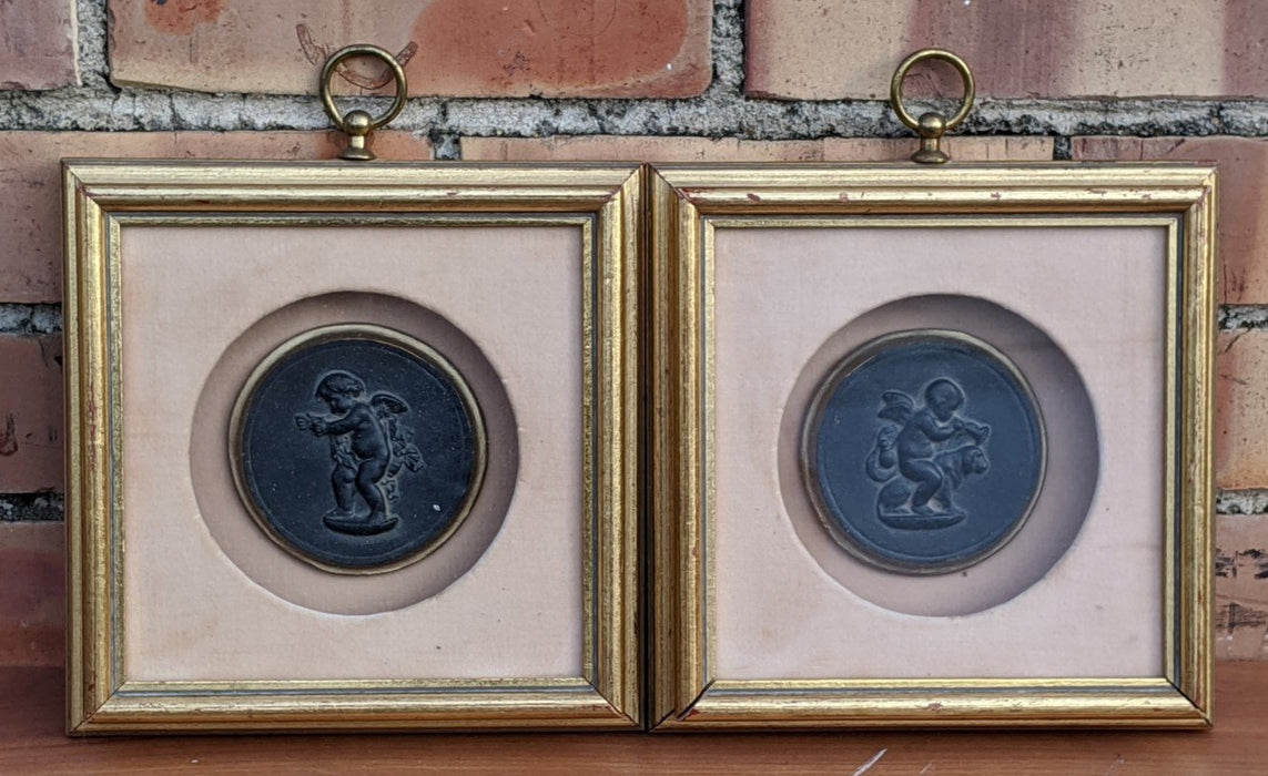 PAIR OF FRAMED COMPOSITION PUTTI CAMEOS