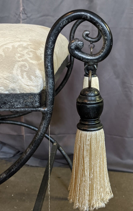SMALL IRON X FORM BENCH WITH TASSELS