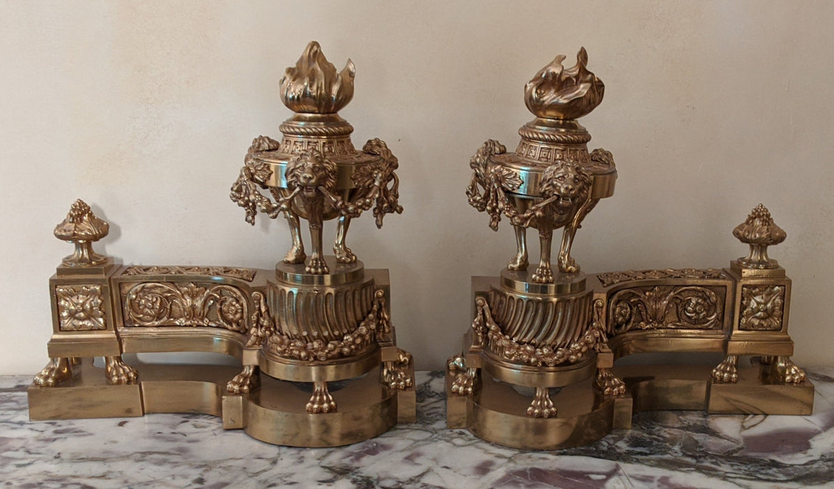 FRENCH BRASS TORCHIERE AND LION CHENETS