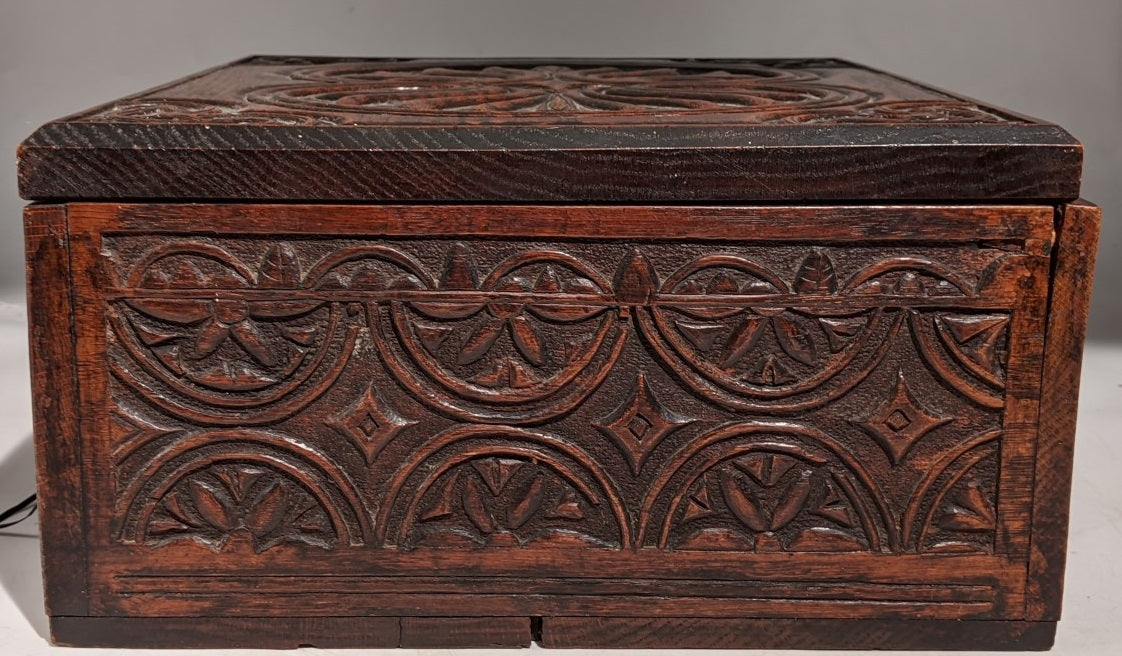 EARLY CARVED BOX WITH IRON HINGES