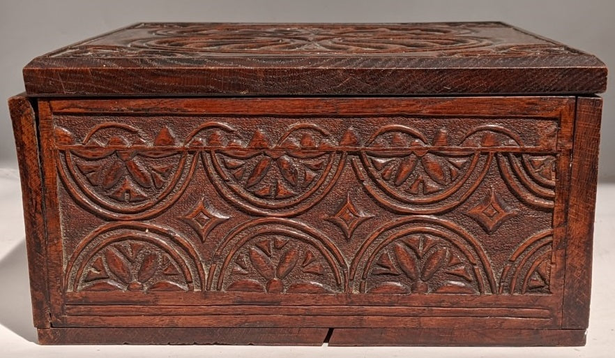 EARLY CARVED BOX WITH IRON HINGES