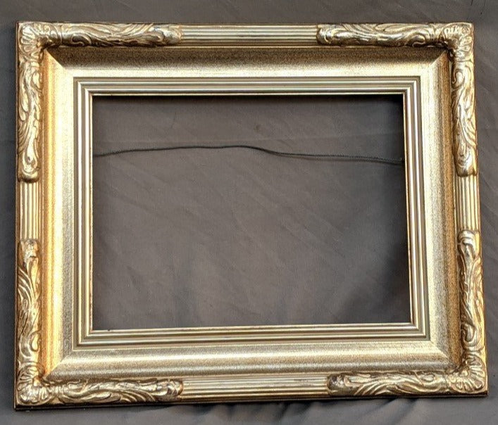 NICELY CARVED SILVER GILT FRAME