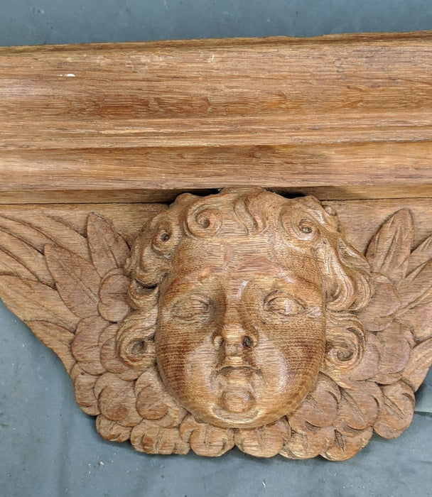 ARCHED CARVED OAK NICHE FRONT FRAME WITH CHERUB FACE