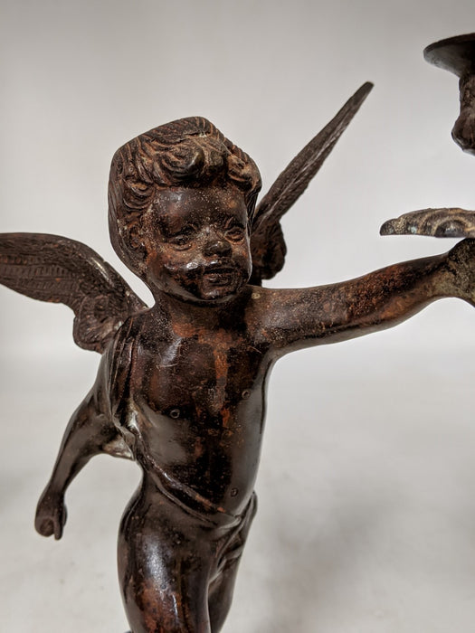 IRON PATINATED CHERUB CANDLE HOLDER