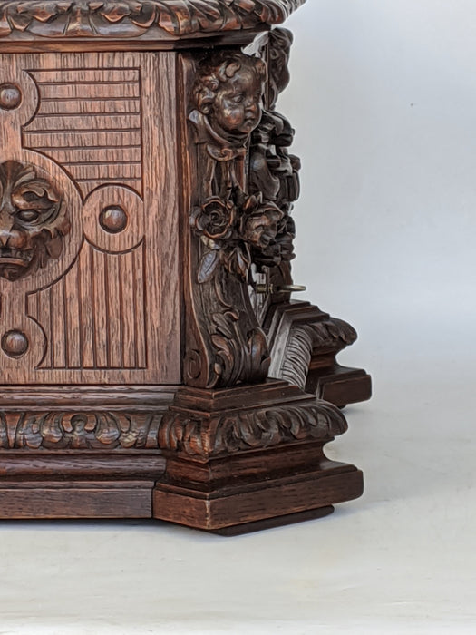 CARVED FRENCH TANTALUS WITH HEADS