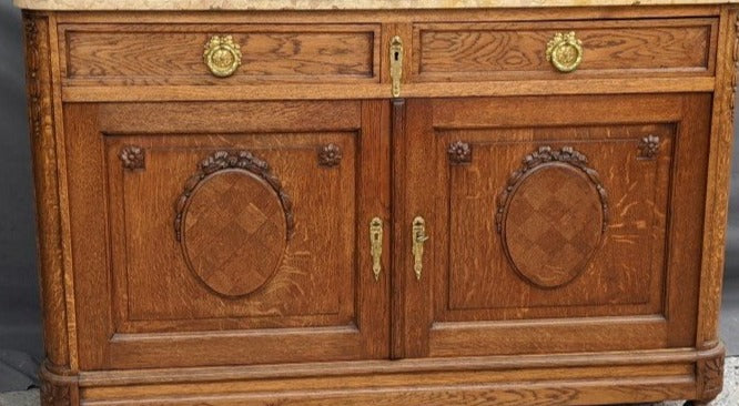 MARBLE TOP CHEST WITH OVALS ON DOORS