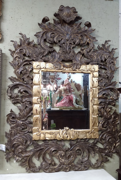 ORNATE CARVED GILTWOOD MIRROR-NOT OLD