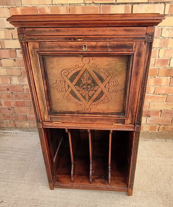 SMALL CABINET WITH CARVED DROPFRONT DOOR AND FILE SLOTS