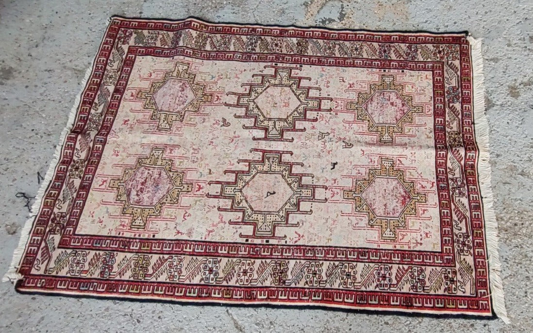 TRIBAL PERSIAN RUG WITH RED BORDER