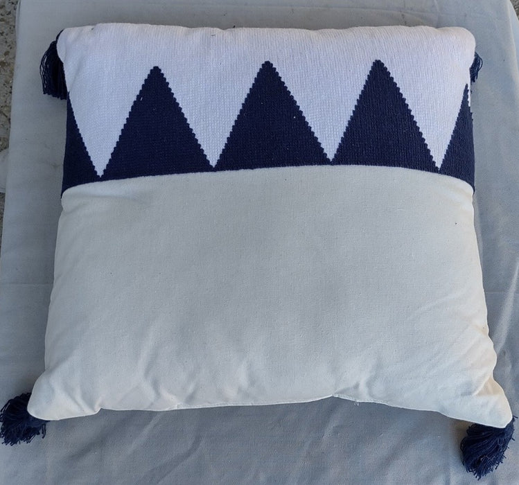 BLUE AND WJITE GEOMETRIC PILLOW WITH TASSELS