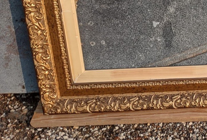 MEDIUM ORNATE GILT FRAME WITH CARVED FILLET