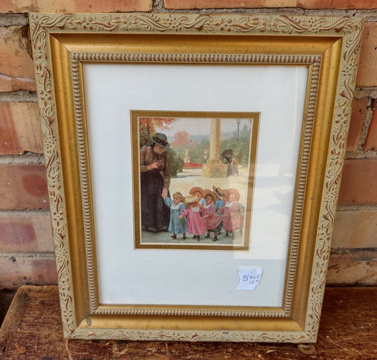 SMALL FRAMED PRINT OF WOMAN WITH SEVERAL GIRLS