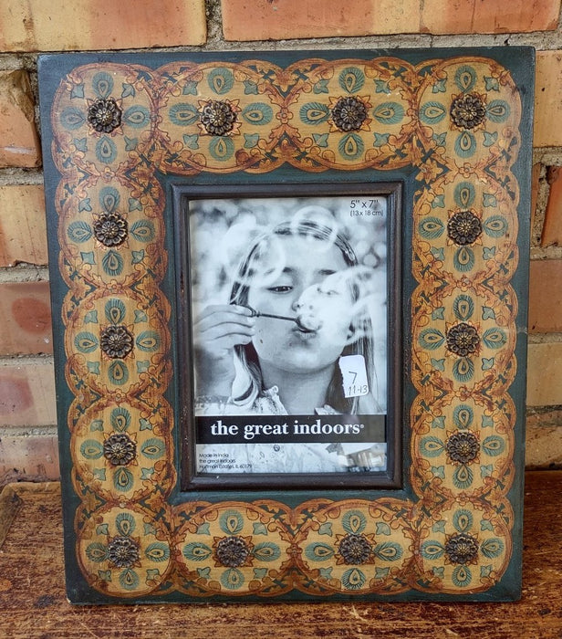 GREEN AND GOLD STUDDED FRAME