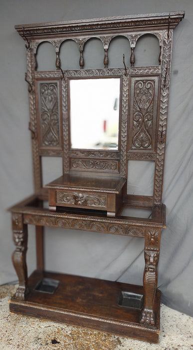 CARVED ENGLISH OAK HALL TREE WITH MIRROR AND UMBRELLA TRAYS