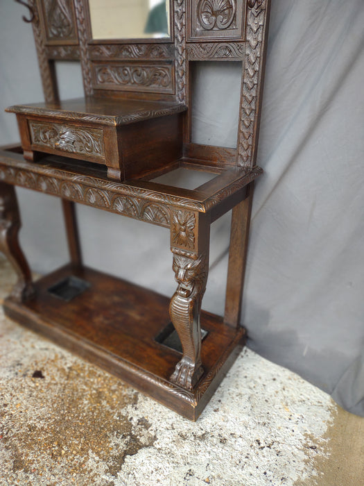 CARVED ENGLISH OAK HALL TREE WITH MIRROR AND UMBRELLA TRAYS