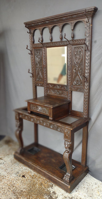 CARVED ENGLISH OAK HALL TREE WITH MIRROR AND UMBRELLA TRAYS