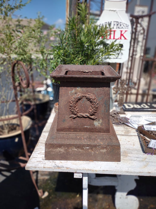 PAIR OF OLD IRON GARDEN URN BASES