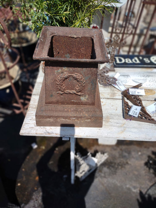 PAIR OF OLD IRON GARDEN URN BASES