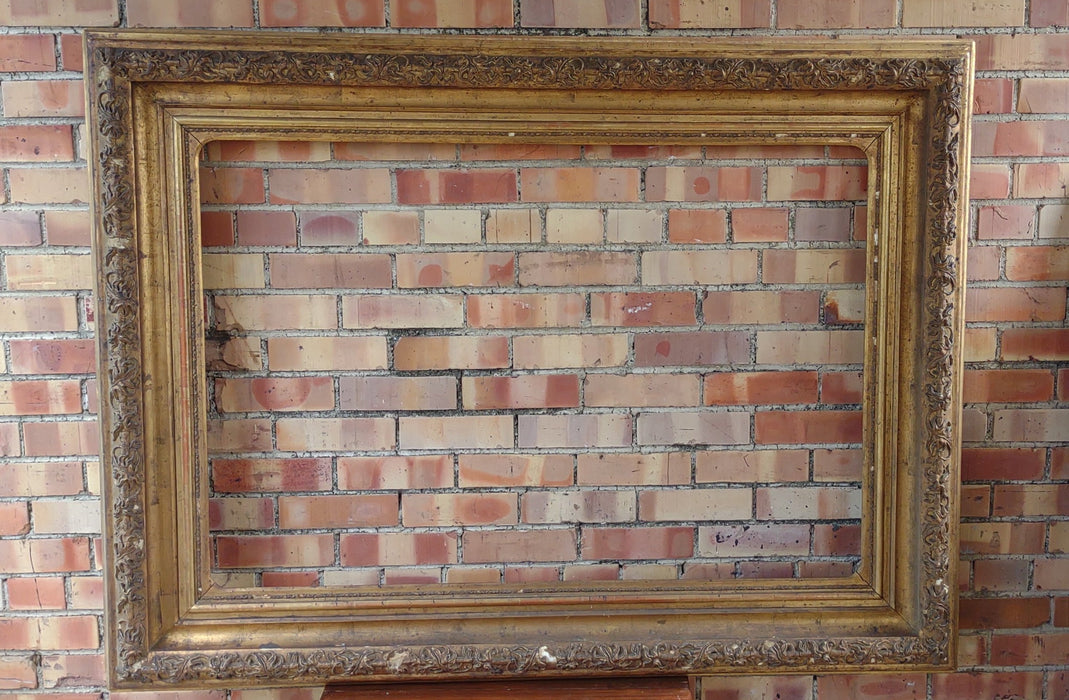 LARGE ORNATE 19TH CENTURY GILT FRAME