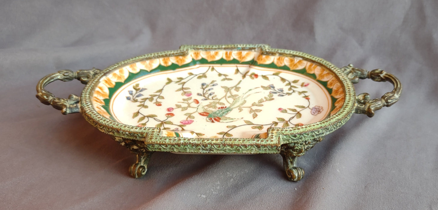 SMALL PORCELAIN AND BRONZE PAINTED DISH
