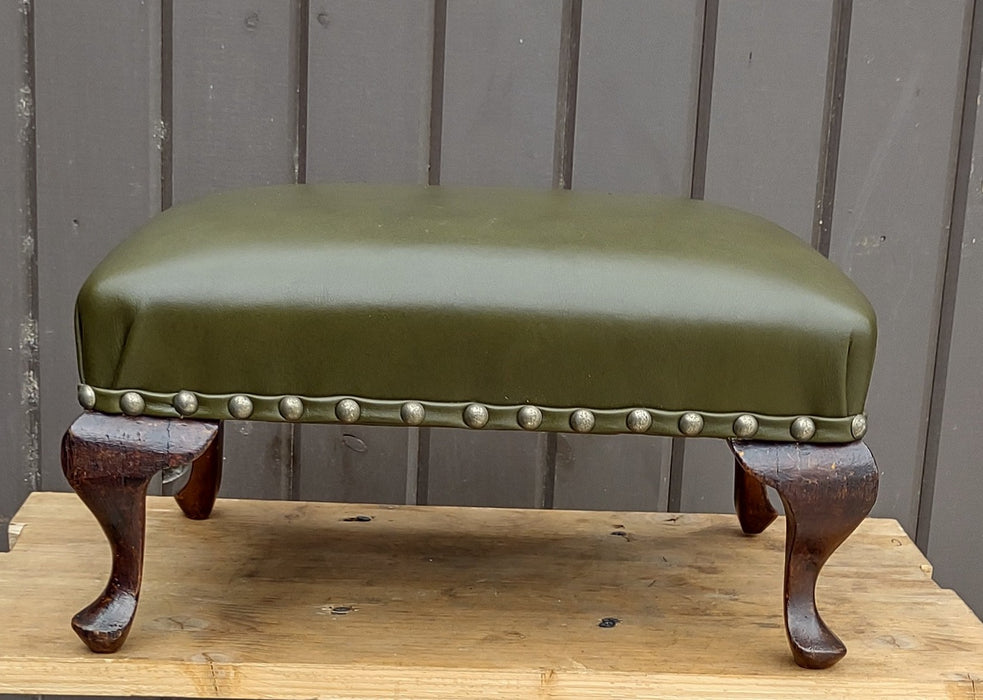 TINY GREEN UPHOLSTERED STOOL