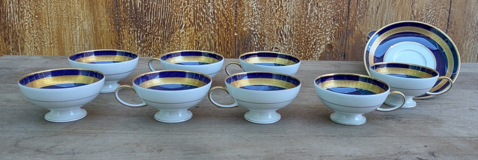 SET OF 8 ROSENTHAL BLUE AND GOLD DEMITASSE CUPS AND SAUCERS