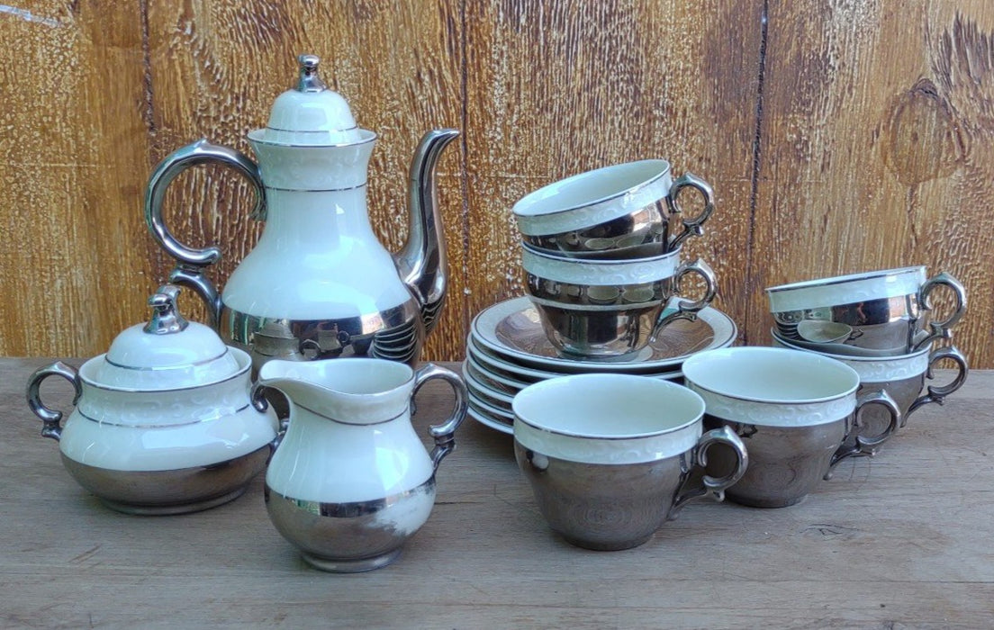 DANISH IVORY COLORED WITH SILVER PLATE 15 PCS TEASET 1 cup as is