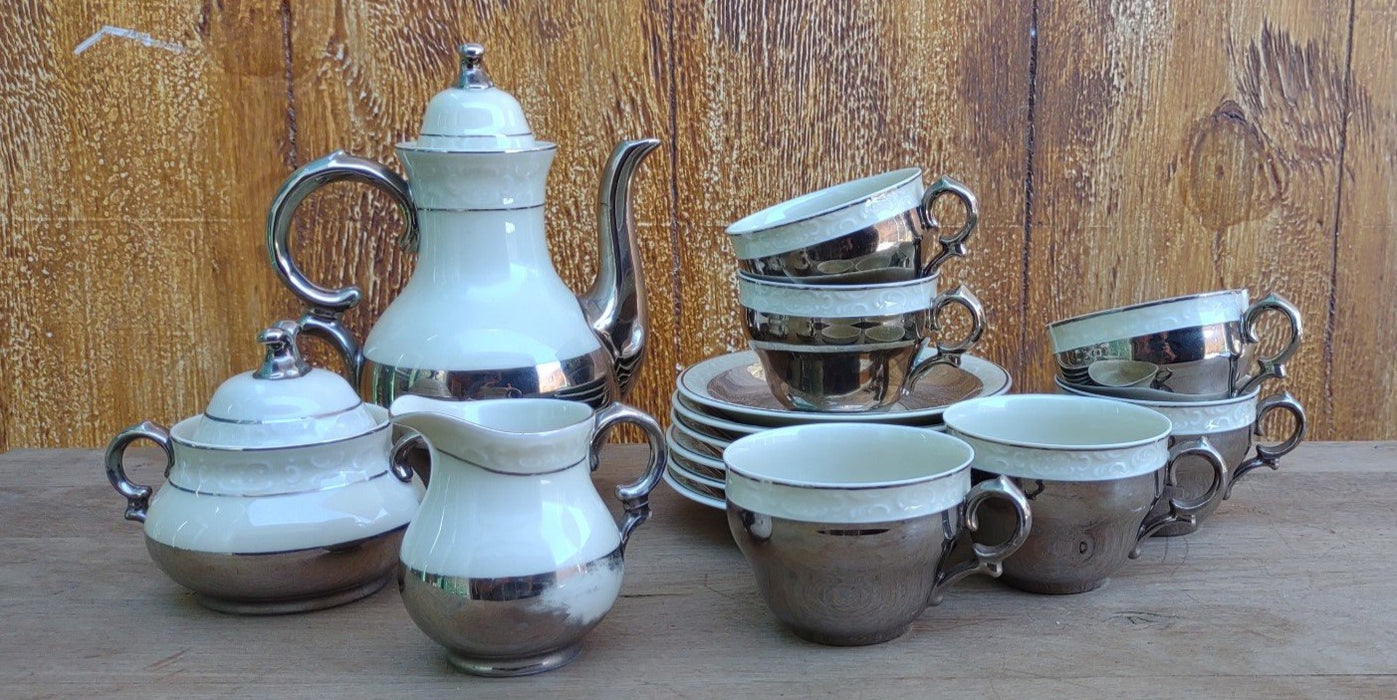 DANISH IVORY COLORED WITH SILVER PLATE 15 PCS TEASET 1 cup as is