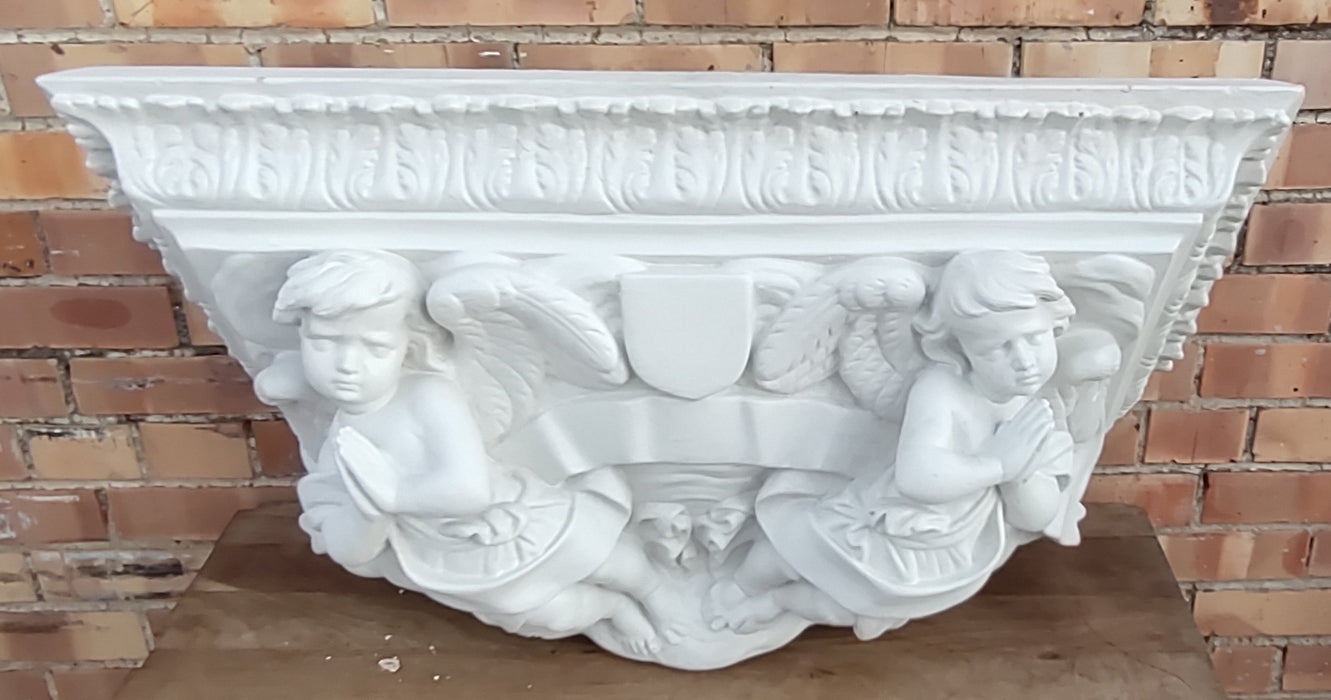 LARGE PLASTER WALL SCONCE SHELF WITH CHERUBS  is it judy werners??