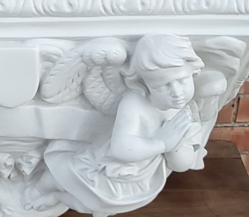 LARGE PLASTER WALL SCONCE SHELF WITH CHERUBS  is it judy werners??