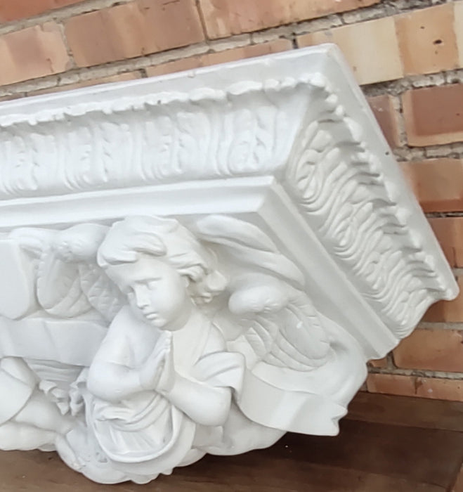 LARGE PLASTER WALL SCONCE SHELF WITH CHERUBS  is it judy werners??