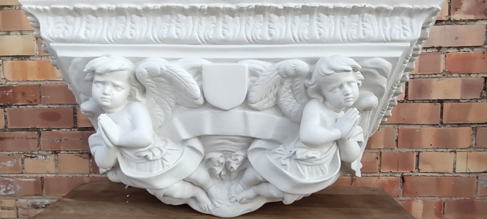 LARGE PLASTER WALL SCONCE SHELF WITH CHERUBS  is it judy werners??