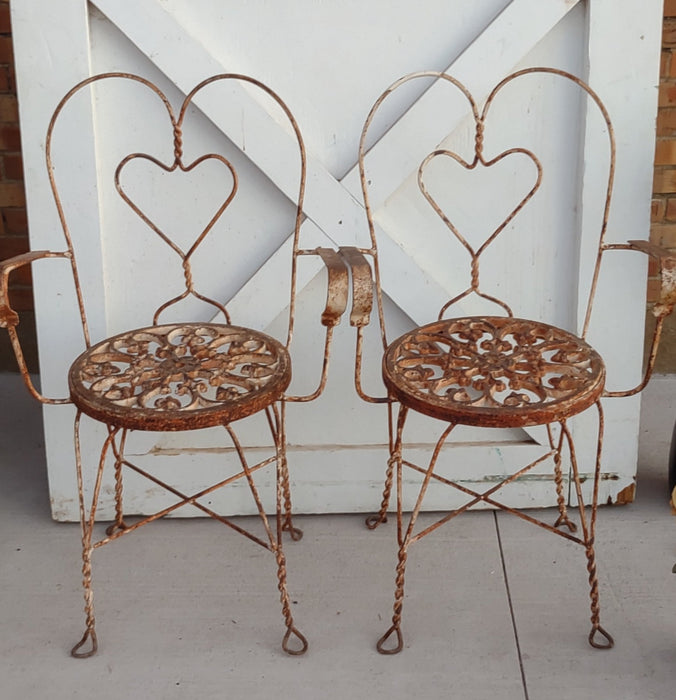 PAIR OF IRON PATIO CHAIRS