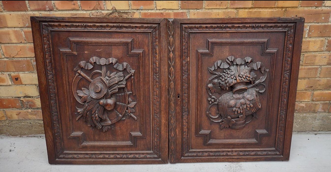 PAIR OF HARVEST CARVED CABINET DOORS