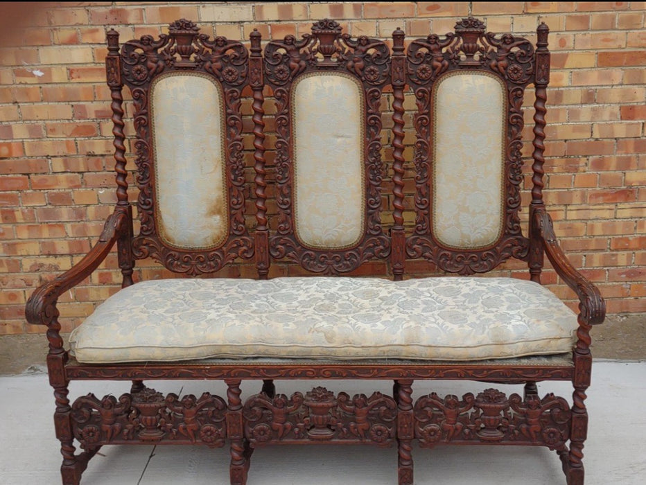 LOUIS XIII BARLEY TWIST SETTEE WITH CHERUBS