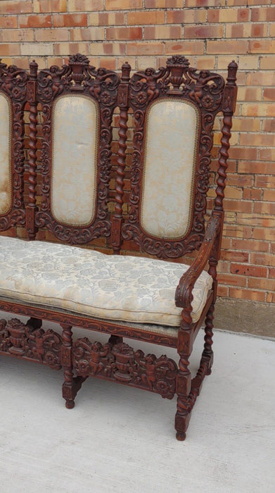 LOUIS XIII BARLEY TWIST SETTEE WITH CHERUBS