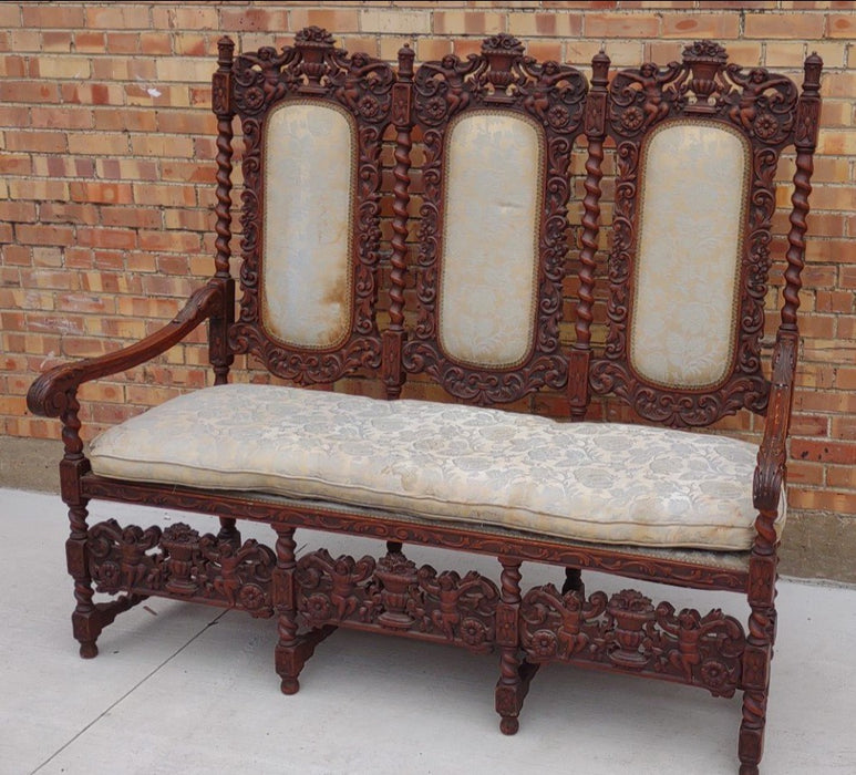 LOUIS XIII BARLEY TWIST SETTEE WITH CHERUBS